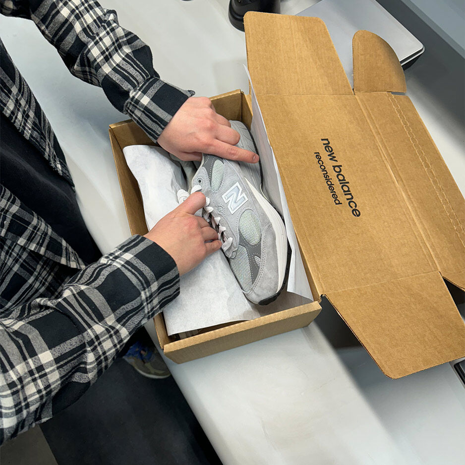 Putting shoes in a shoe box